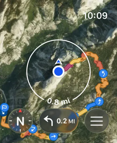 Point-to-point route created on the Apple Watch over satellite imagery, with a location puck and search-radius ring